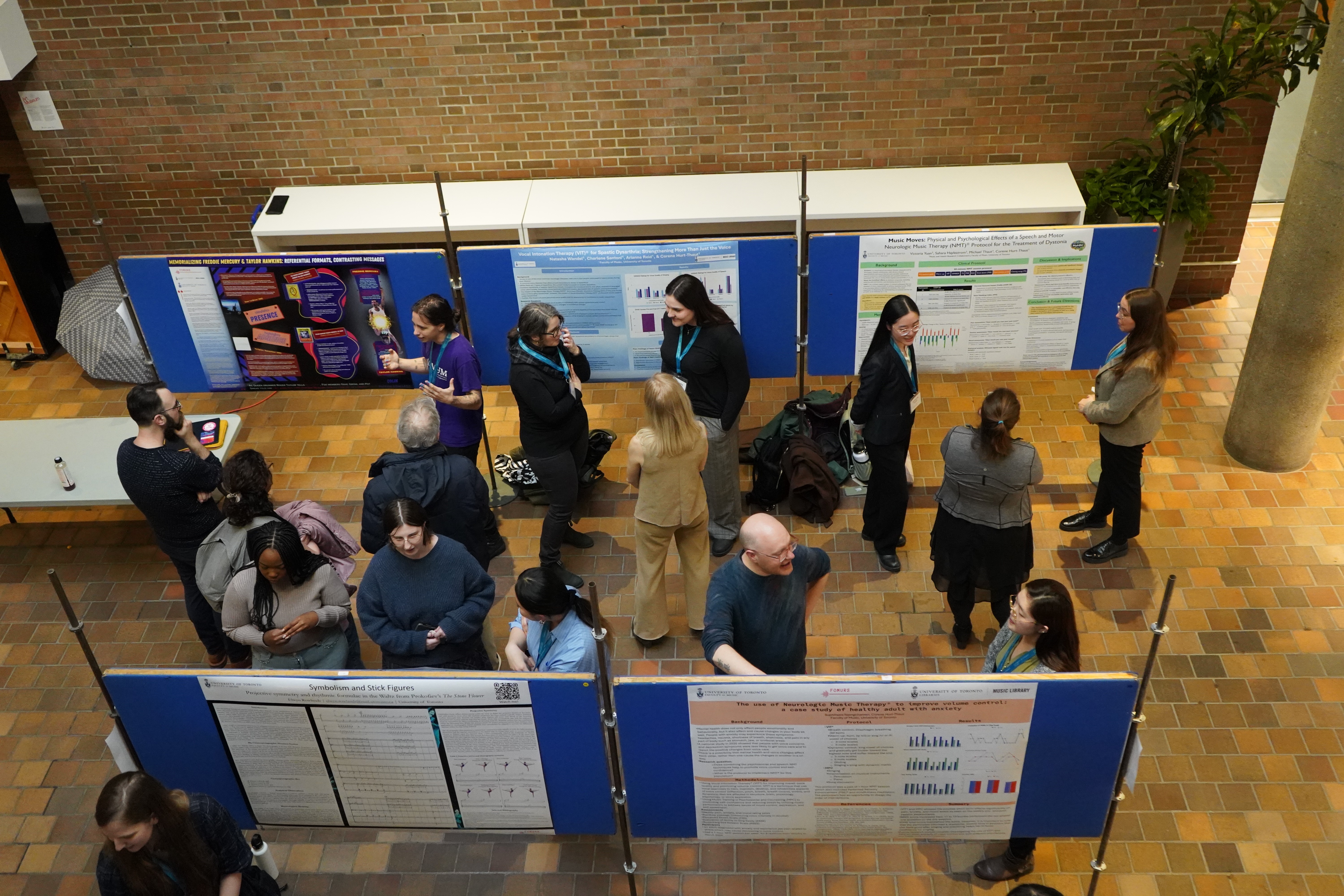 graduate showcase aerial shot highlighting the participants speaking with Faculty of Music community.