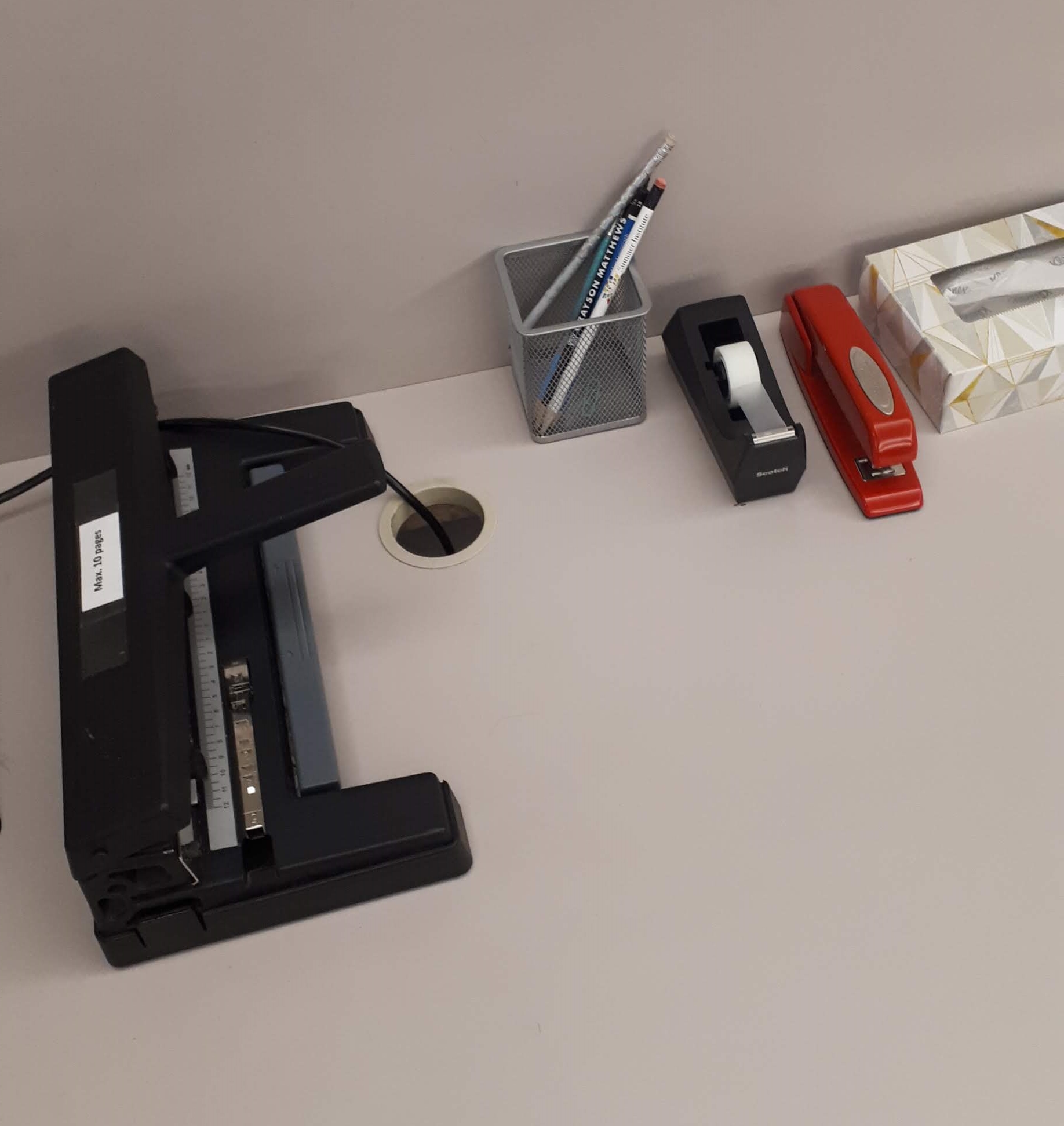 Hole punch and stapler on table at the Music Library