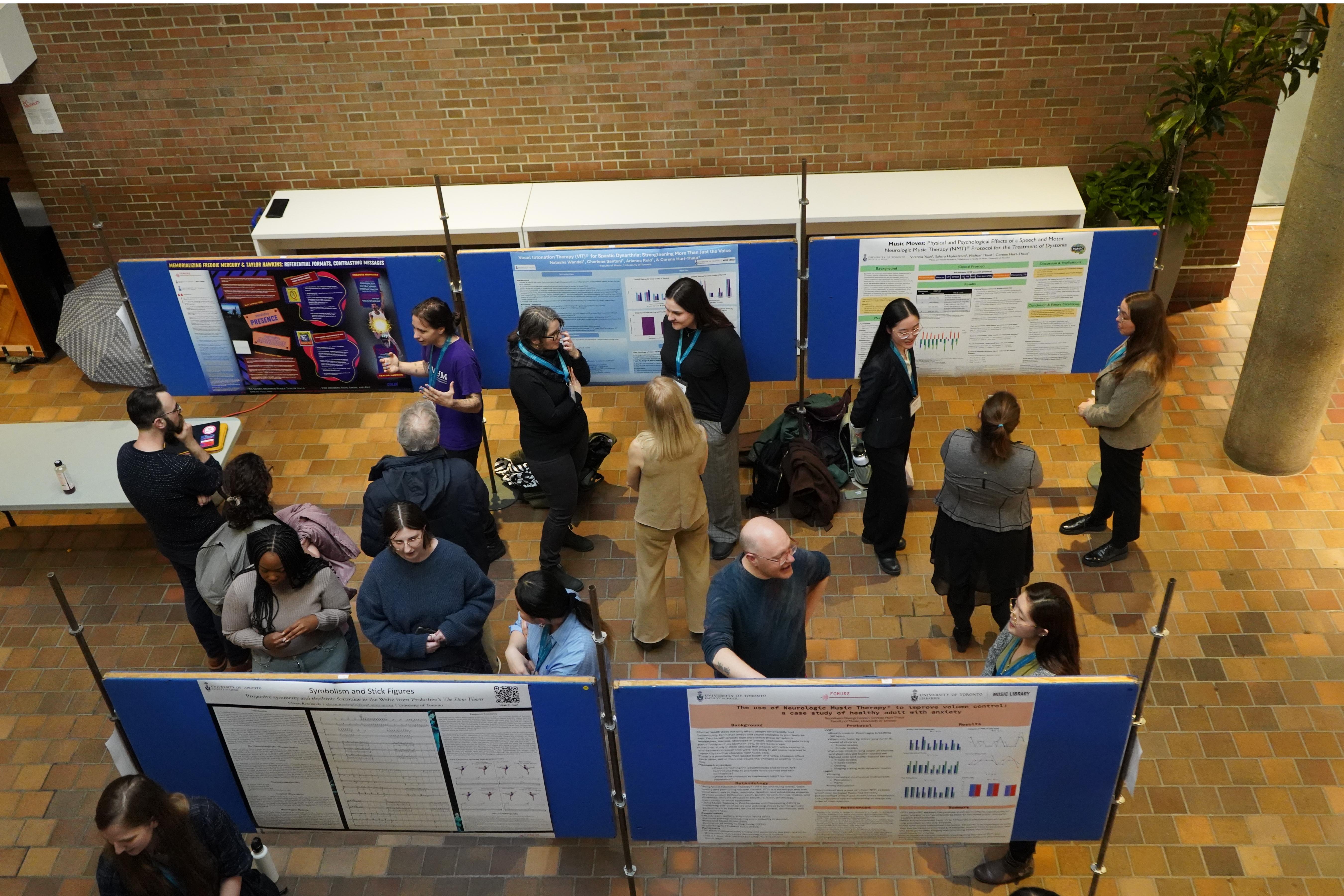 graduate showcase aerial shot highlighting the participants speaking with Faculty of Music community.