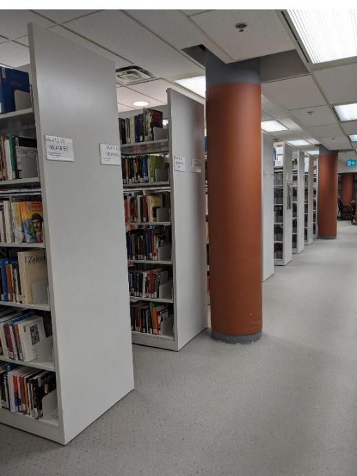 Book stacks on upper level of library