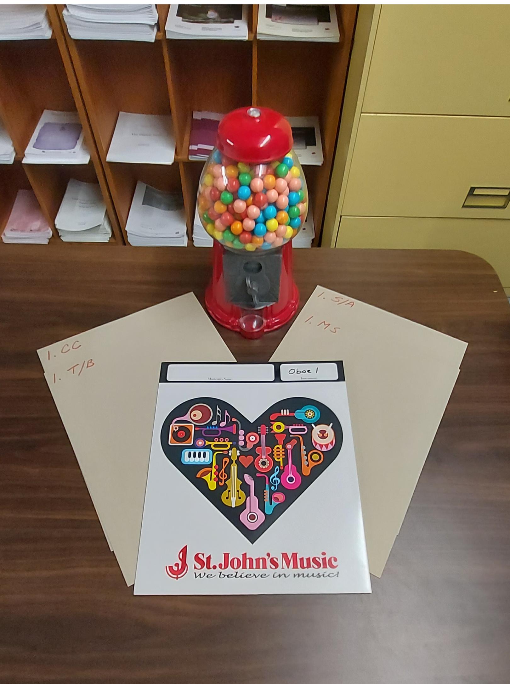 St. John's Music folder and gumball machine in the Music Library's Performance Collection